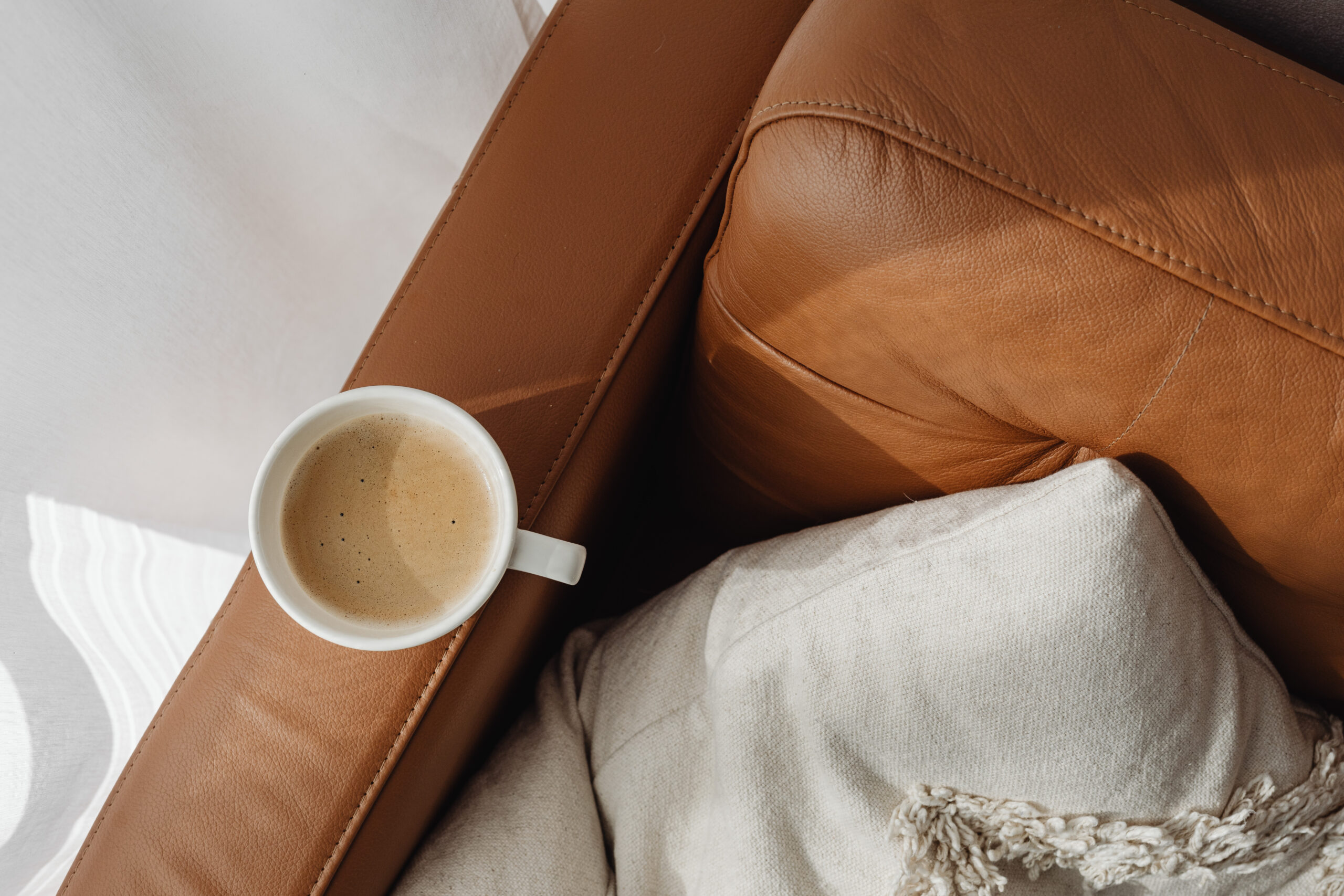 Privacy Policy - image of cup of tea on comfy chair