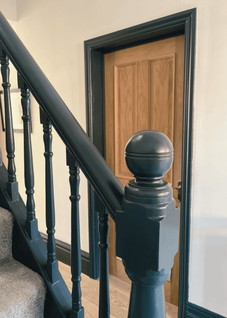 Hallway design - close up of dark staircase spindles